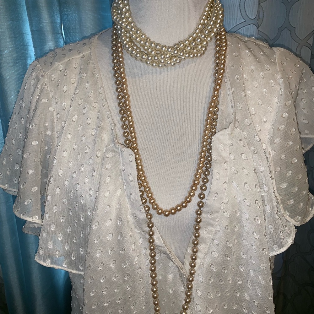 Cream flow top. Sexy front-low buttons.